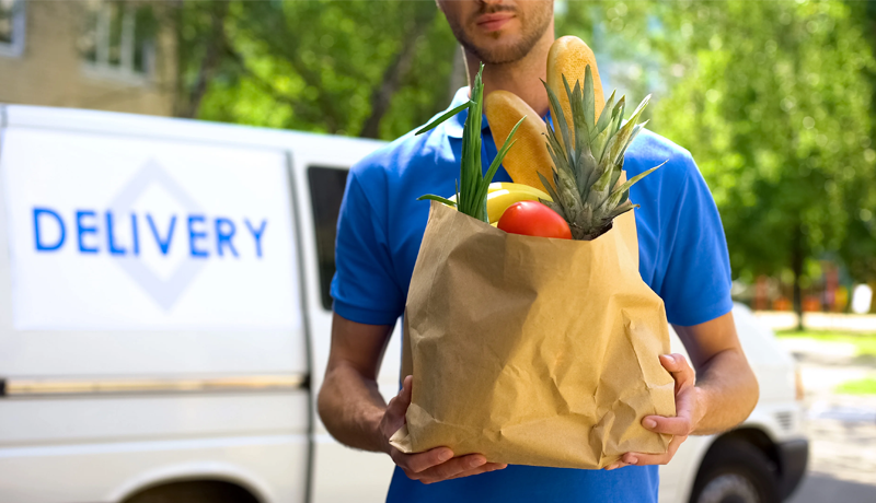 a-delivery-person-deliving-groceries- Food Crowd-techxmedia